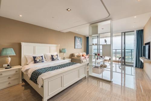 Imagen de la habitación del Hotel Van-pretty Residence Haitang Bay Sanya. Foto 5