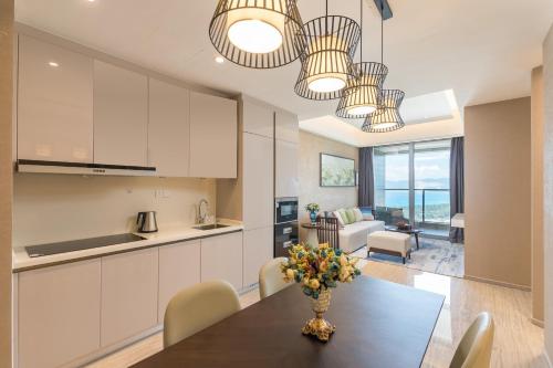 Imagen de la habitación del Hotel Van-pretty Residence Haitang Bay Sanya. Foto 6