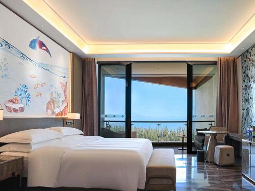 Imagen de la habitación del Hotel Vaperse Hainan Clear Water Bay. Foto 5