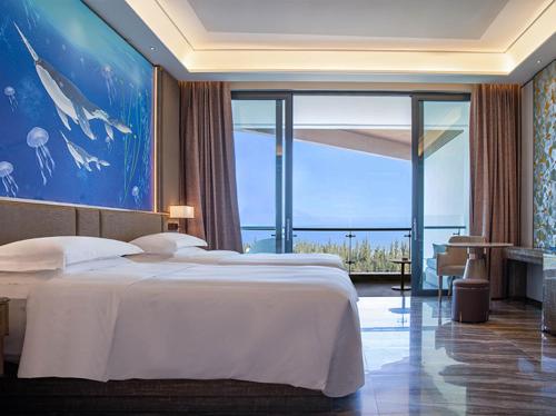 Imagen de la habitación del Hotel Vaperse Hainan Clear Water Bay. Foto 9