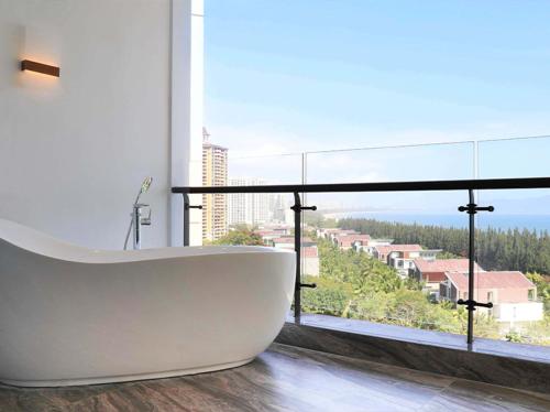 Imagen de la habitación del Hotel Vaperse Hainan Clear Water Bay. Foto 10