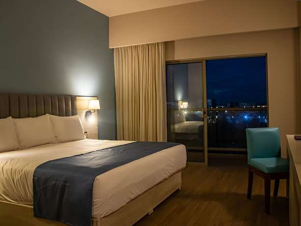 Imagen de la habitación del Hotel Varali Grand. Foto 8