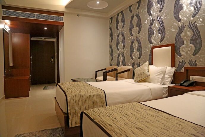 Imagen de la habitación del Hotel Varanasi Inn. Foto 20