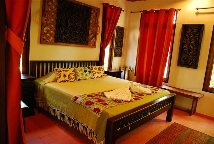 Imagen de la habitación del Hotel Varinda Garden Resort. Foto 9