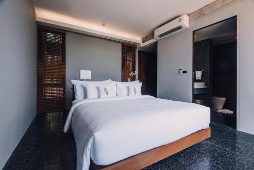 Imagen de la habitación del Hotel Varivana Resort Koh Phangan. Foto 8