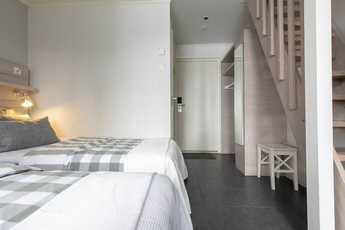 Imagen de la habitación del Hotel Varjola Holiday Center. Foto 19