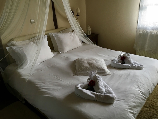 Imagen de la habitación del Hotel Varosi 4 Seasons. Foto 9