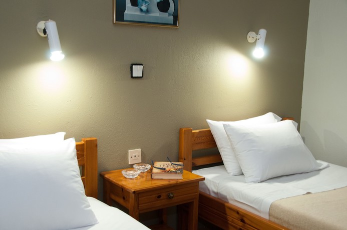 Imagen de la habitación del Hotel Varouxakis. Foto 11