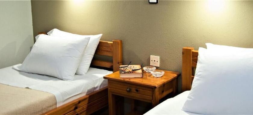 Imagen de la habitación del Hotel Varouxakis. Foto 15