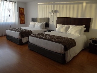 Imagen de la habitación del Hotel Varuna. Foto 21