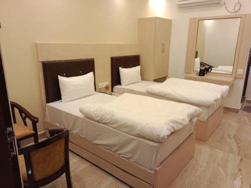 Imagen de la habitación del Hotel Varuna Grand. Foto 5