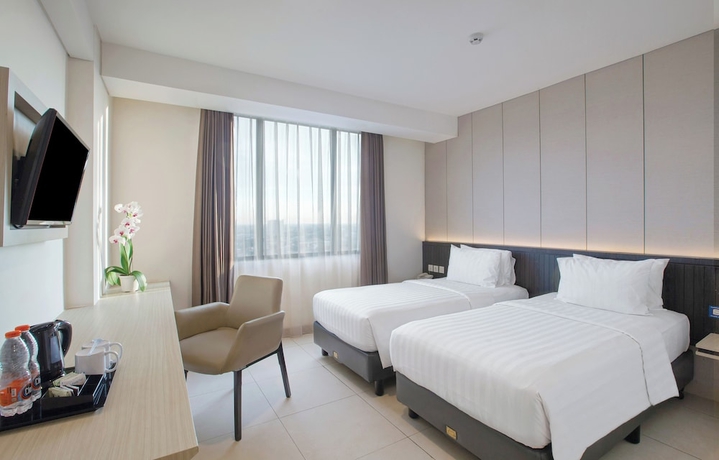 Imagen de la habitación del Hotel Vasaka Makassar. Foto 3