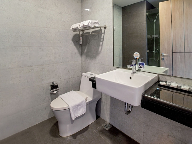 Imagen de la habitación del Hotel Vasaka Makassar. Foto 4