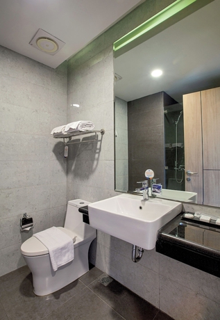 Imagen de la habitación del Hotel Vasaka Makassar. Foto 8