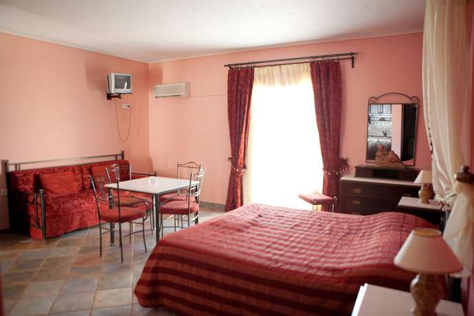 Imagen de la habitación del Hotel Vasilaras. Foto 17