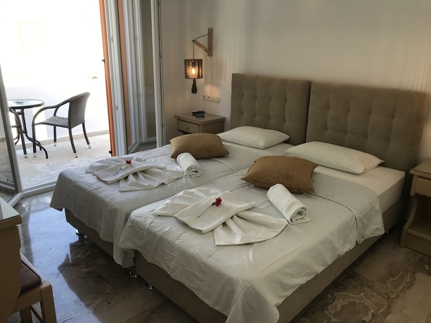 Imagen de la habitación del Hotel Vassiliki Rooms. Foto 11