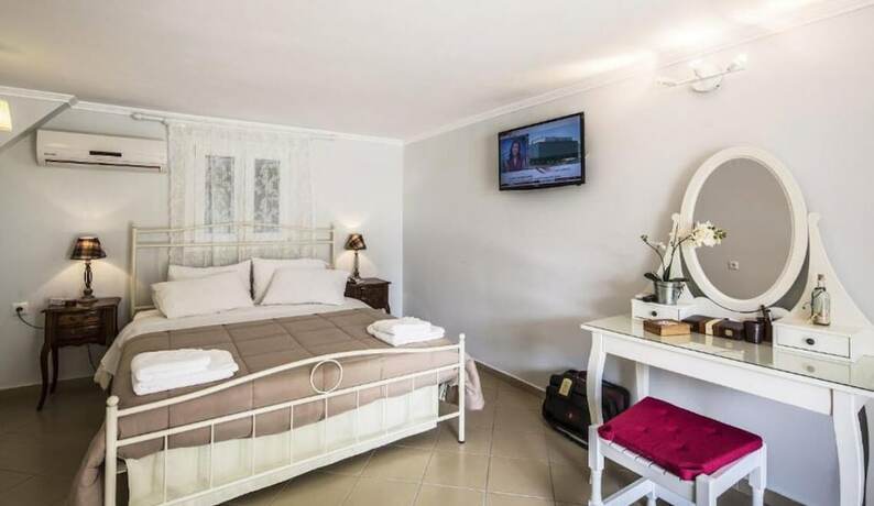 Imagen de la habitación del Hotel Vassilis Guest House. Foto 11