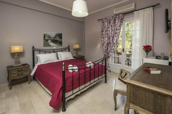 Imagen de la habitación del Hotel Vassilis Guest House. Foto 15