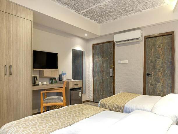 Imagen de la habitación del Hotel Vastu Boutique. Foto 11