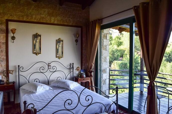 Imagen de la habitación del Hotel Vathyskia Guesthouse. Foto 14