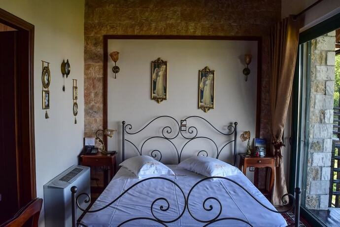 Imagen de la habitación del Hotel Vathyskia Guesthouse. Foto 16