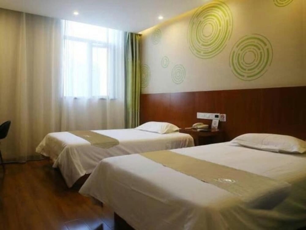 Imagen de la habitación del Hotel Vatica Shanghai International Tourism Resort Luoshan Road Subway Station Hotel. Foto 11