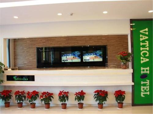 Imagen de la habitación del Hotel Vatica Shanghai International Tourist Resort Huaxia E Road Metro Station. Foto 7