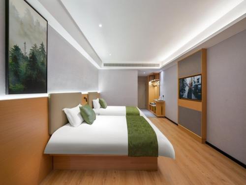 Imagen de la habitación del Hotel Vatica Shuyang Central Mall Nanjing Road. Foto 13