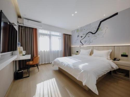 Imagen de la habitación del Hotel Vatica Shuyang Central Mall Nanjing Road. Foto 17