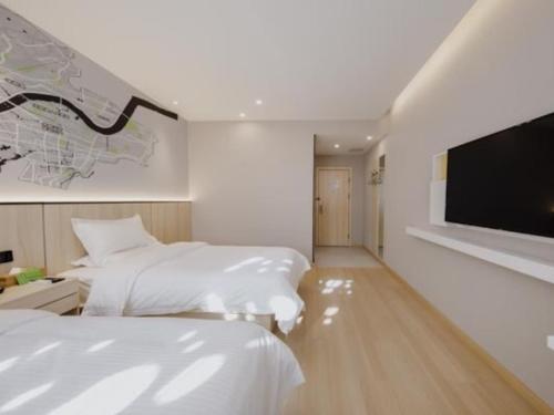 Imagen de la habitación del Hotel Vatica Shuyang Central Mall Nanjing Road. Foto 18