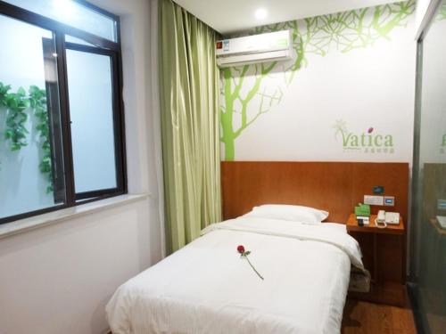 Imagen de la habitación del Hotel Vatica Suzhou Changshu Shimao Residence. Foto 11