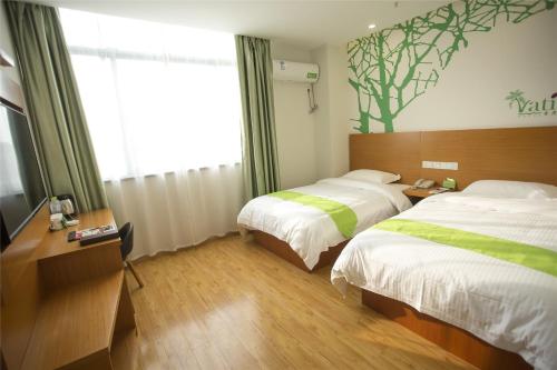 Imagen de la habitación del Hotel Vatica Tianjin Dagang Xuefu Road University Town. Foto 8
