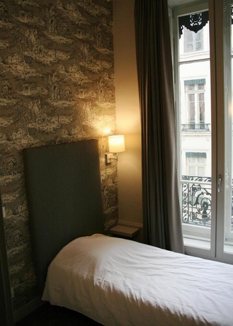 Imagen de la habitación del Hotel Vaubecour. Foto 6