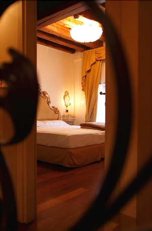 Imagen de la habitación del Hotel Vecellio. Foto 11