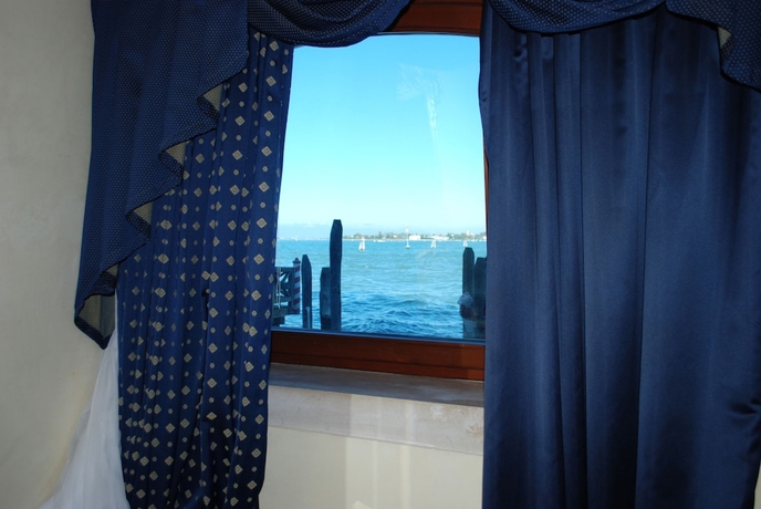 Imagen de la habitación del Hotel Vecellio. Foto 14