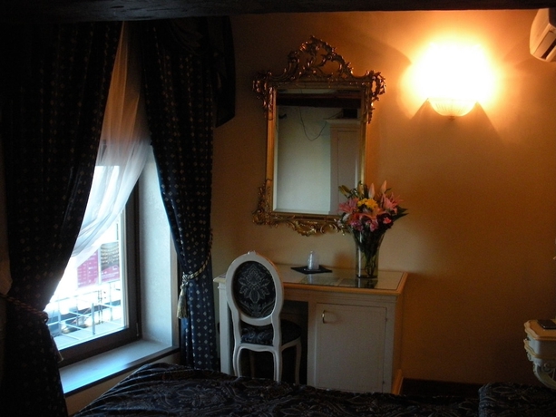 Imagen de la habitación del Hotel Vecellio. Foto 15