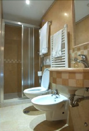 Imagen de la habitación del Hotel Vecellio. Foto 17