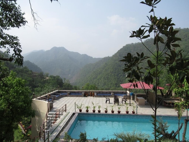 Imagen de la piscina del Hotel Veda5 Ayurveda and Yoga Retreat. Foto 18