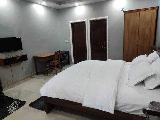 Imagen de la habitación del Hotel Vedas and Villas. Foto 2
