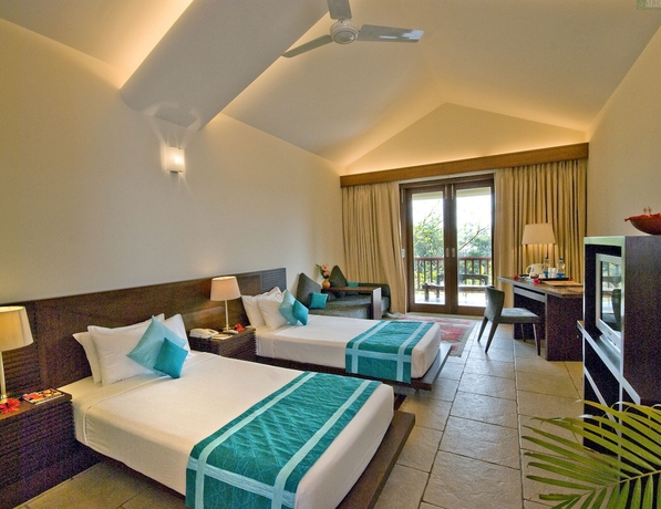 Imagen de la habitación del Hotel Vedic Village Spa Resort. Foto 8