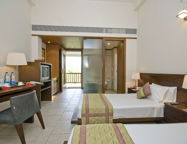 Imagen de la habitación del Hotel Vedic Village Spa Resort. Foto 9