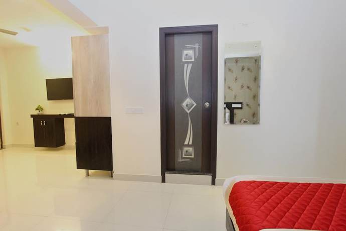 Imagen de la habitación del Hotel Vee Suites Bangalore. Foto 7