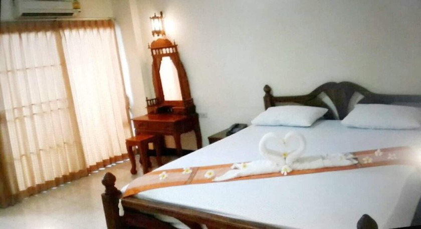 Imagen de la habitación del Hotel Veerasuda Condotel. Foto 7