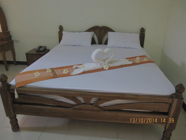 Imagen de la habitación del Hotel Veerasuda Condotel. Foto 10