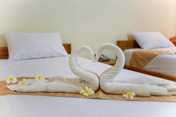 Imagen de la habitación del Hotel Veerasuda Condotel. Foto 13