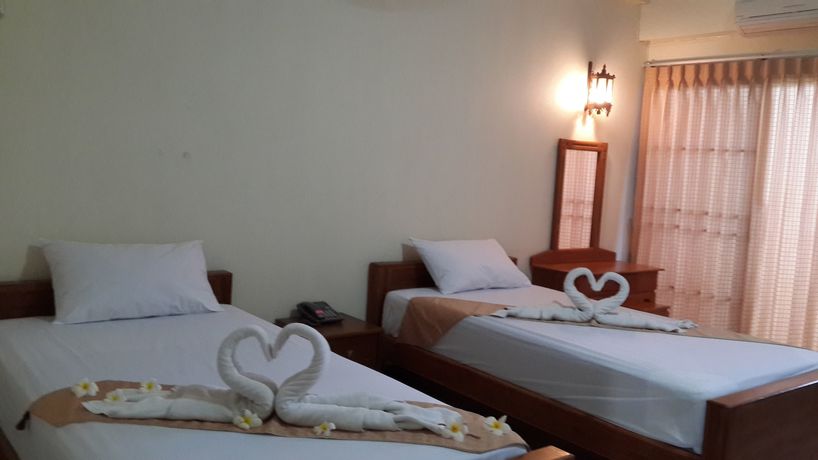 Imagen de la habitación del Hotel Veerasuda Condotel. Foto 14