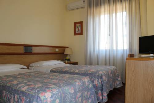 Imagen de la habitación del Hotel Vega Perugia. Foto 11