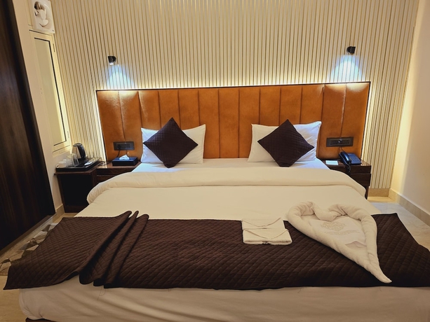 Imagen de la habitación del Hotel Vega and Restro and The OM residency. Foto 9