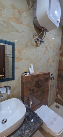 Imagen de la habitación del Hotel Vega and Restro and The OM residency. Foto 14