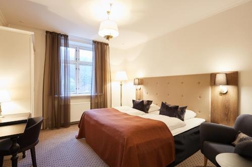 Imagen de la habitación del Hotel Vejlefjord. Foto 8